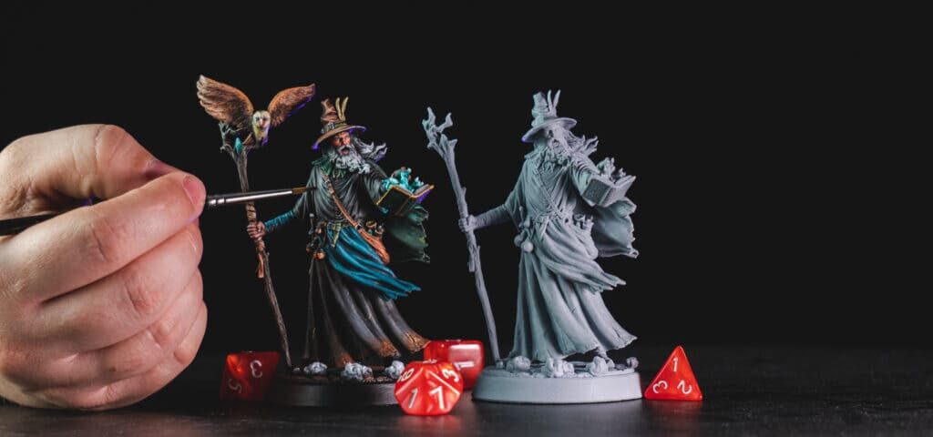 Loot Studio's miniature called Alberus Ribeirus from the bundle Wizards & Sorceres. There are two versions on the image: One painted and one not painted.