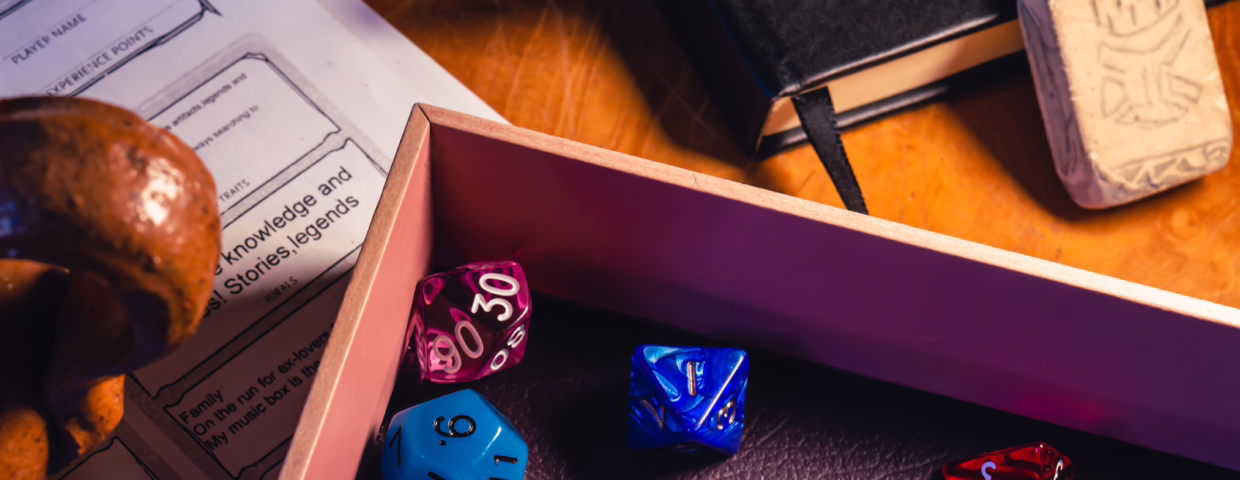 Elements used during an RPG session. There are dices and character sheets