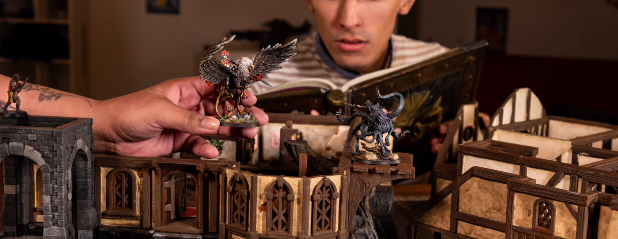 RPG party using loot studios' miniatures, dm screen and tavern